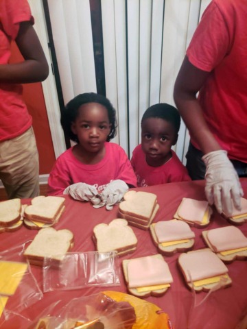 Kids making sandwiches